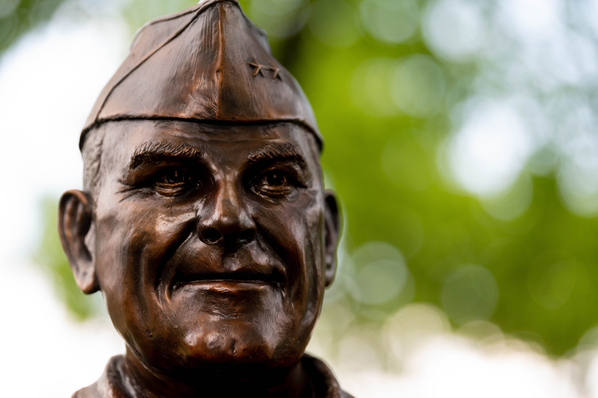statue sits in park