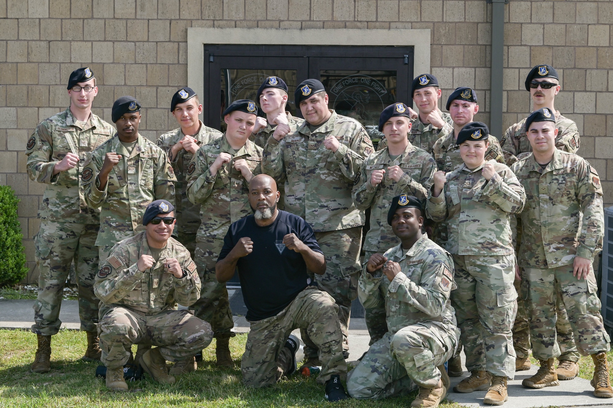 The 23rd Security Forces Squadron S30-B2 “Thunder Cats” flight poses for a photo with Krav Maga instructor Bobby Cumby after four hours of training, April 13, 2022, at Moody Air Force Base, Georgia. Security forces defenders will continue to practice their Krav Maga and Air Force combative skills to be an even more effective force and continue defending installations anywhere at any time. (U.S. Air Force photo by Senior Airman Rebeckah Medeiros)