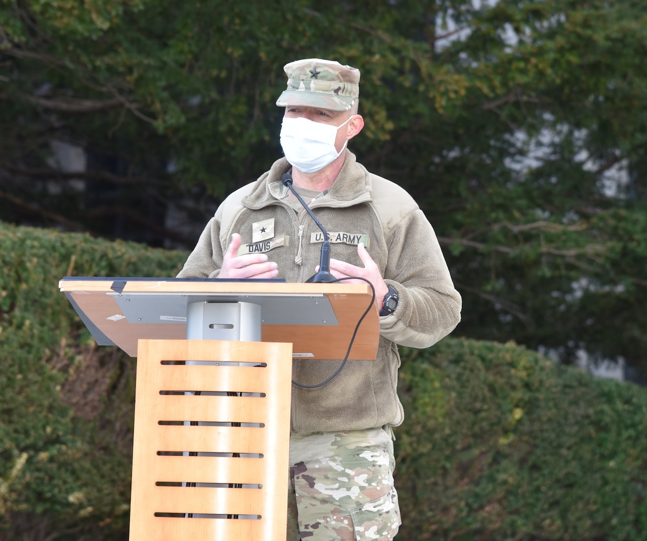 Brig. Gen. Jack Davis, director of Walter Reed National Military Medical Center (WRNMMC), speaks to Solidiers and Sailors after colors at WRNMMC in Bethesda, Maryland, May, 26, 2022