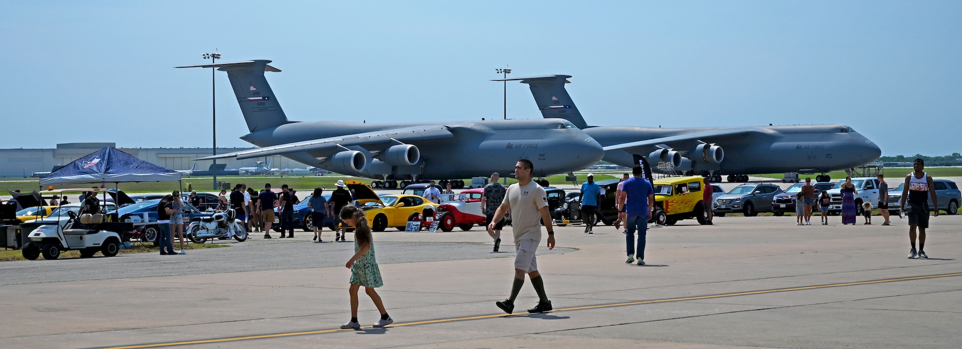 The 433rd Airlift Wing hosts its first Family Day since 2019 during the unit training assembly May 15, 2022, at Joint Base San Antonio-Lackland, Texas. Reserve Citizen Airmen and their families were able to view a car show, a C-5M Super Galaxy display, eat free food and participate in other events. (U.S. Air Force photo by Master Sgt. Samantha Mathison)