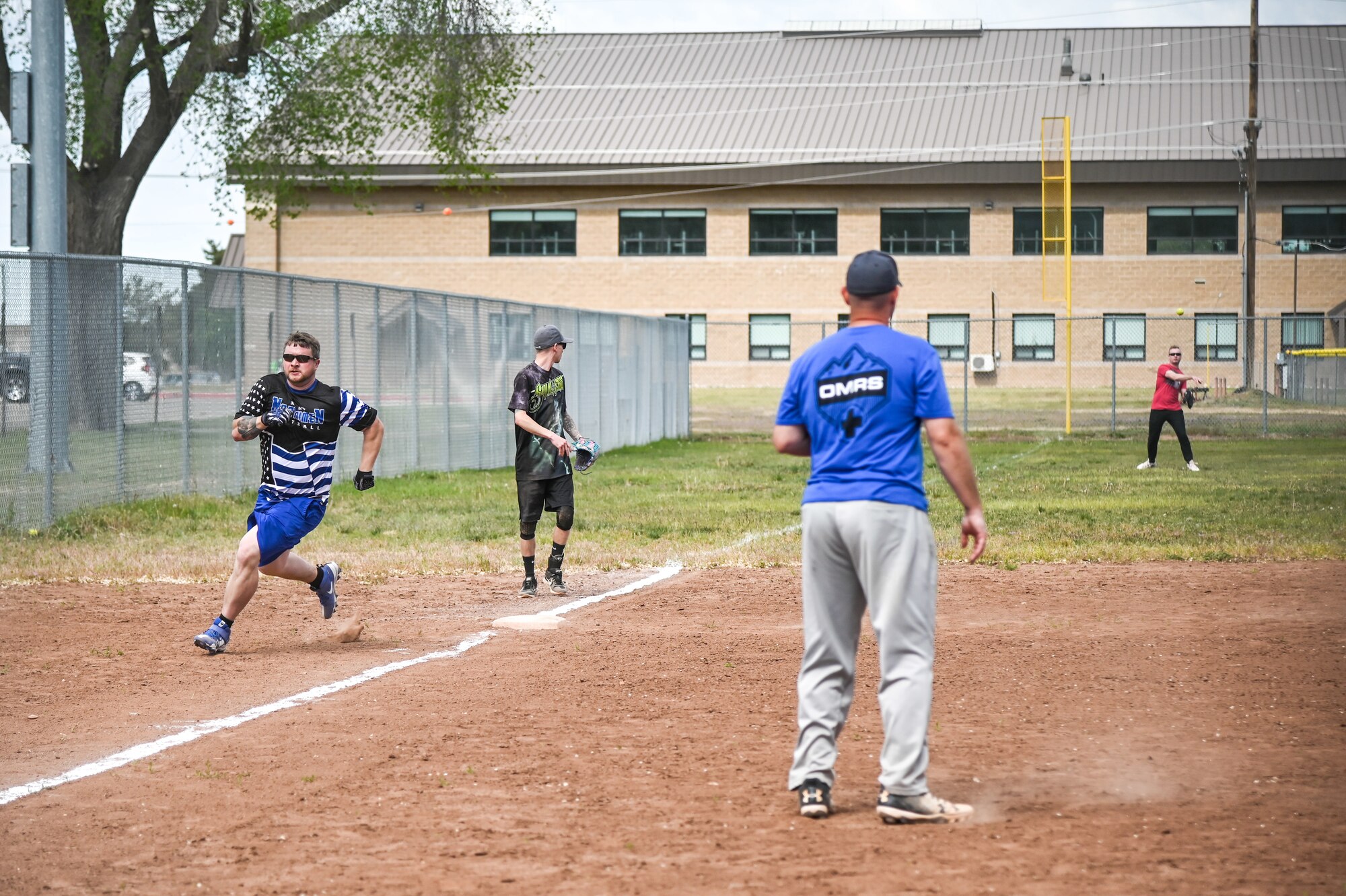 Base first responder's participate in a softball tournament.