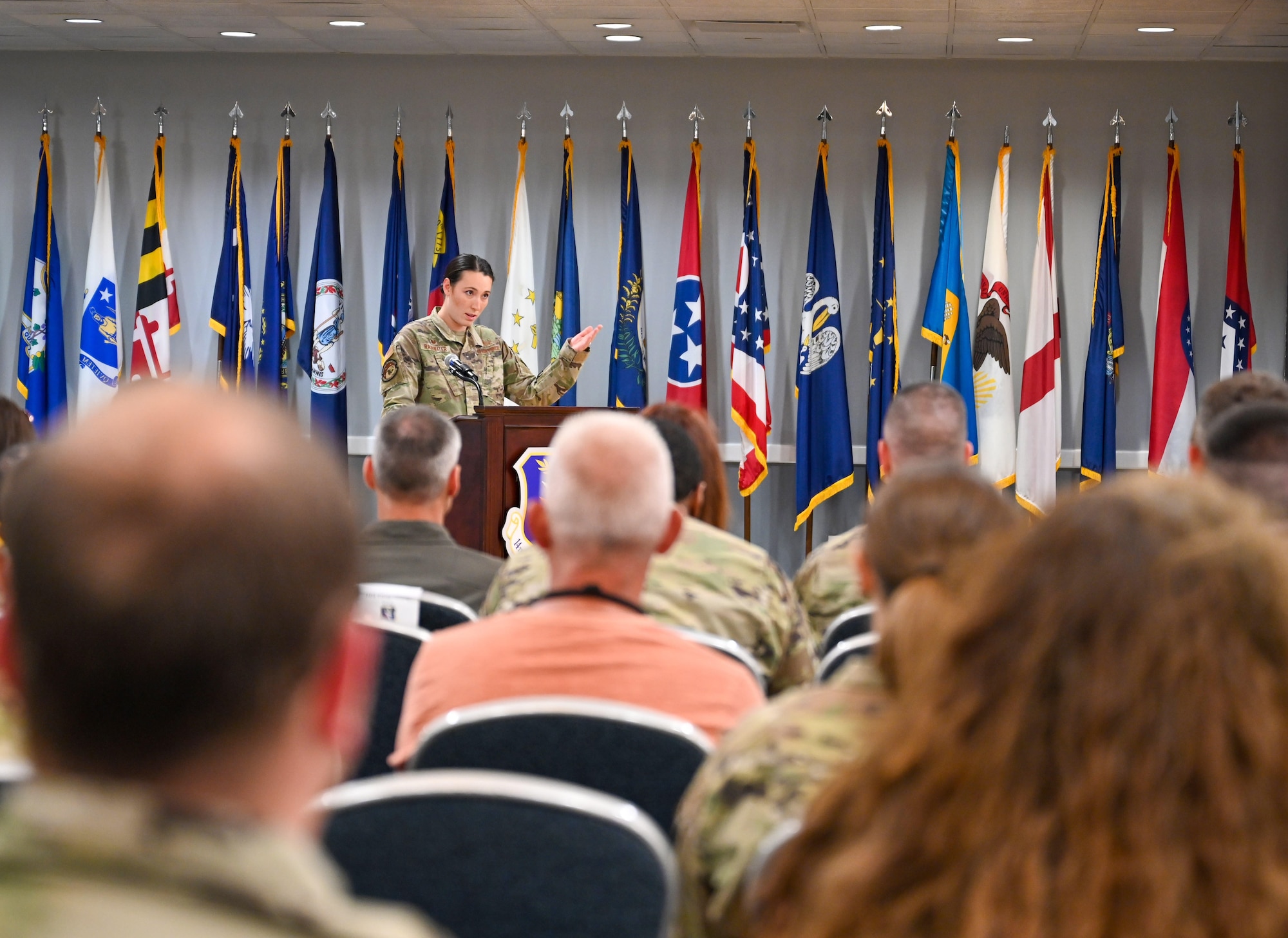 Maj. Elizabeth Rainwater, 14th Communications Squadron commander, speaks at the Asian American and Pacific Islander Heritage Month Observance on May 19, 2022, at Columbus Air Force Base, Miss. This month was specifically chosen to commemorate the arrival of the first Japanese immigrants to the United States on May 7, 1843, and the completion of the transcontinental railroad, which was built by mostly Chinese immigrants, on May 10, 1869. (U.S. Air Force photo by Senior Airman Davis Donaldson)