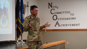 U.S. Air Force Chief Master Sgt. Stephanie Patterson, Mathies NCO Academy commandant, addresses senior leadership at the MNCOA on Keesler Air Force Base, Mississippi, May 19, 2022. MNCOA staff held the open house to inform base leadership on the NCOA leadership courses taught to technical sergeants.