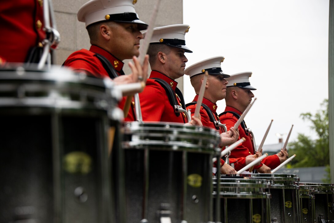 Marines with “The Commandant’s Own,” U.S. Marine Drum and Bugle Corps, prepare to perform at the Naval Academy Commissioning Week in Annapolis, Md., May 24, 2022. Congratulations to midshipmen who will graduate with the Class of 2022 and serve as commissioned officers in the U.S. Navy or U.S. Marine Corps. (U.S. Marine Corps photo by Cpl. Morales)