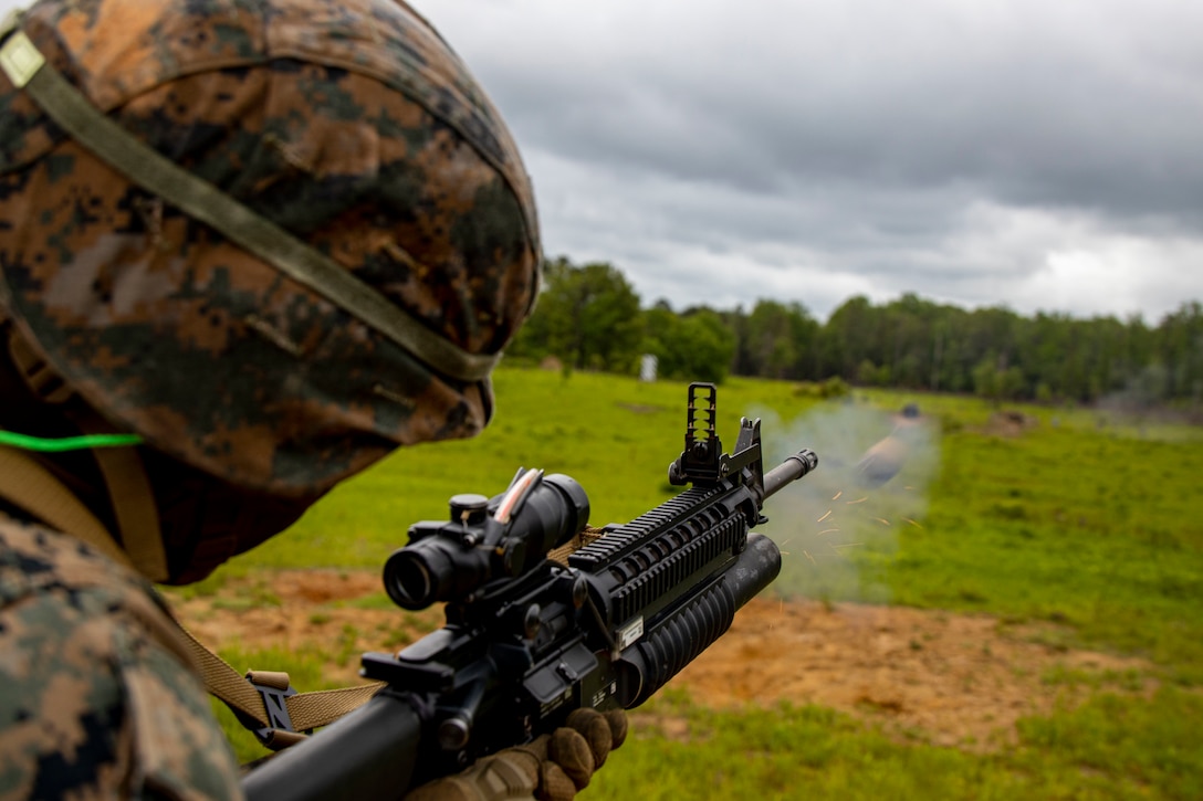 Marines with first platoon, Bravo Company, Marine Barracks Washington, conduct infantry training at Marine Corps Base Quantico, Va., May 25, 2022. The Marines conducted an air insert via MV-22 Ospreys and honed weapons-handling skills during battle drills utilizing the AT-4 light anti-armor weapon, M203 grenade launcher, M72 light anti-armor weapon, and M16A4 rifle. 

 (U.S. Marine Corps photo by Cpl. Mark A. Morales)