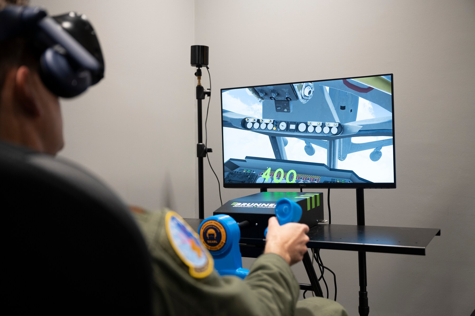 Photo of Airman training with a virtual reality headset