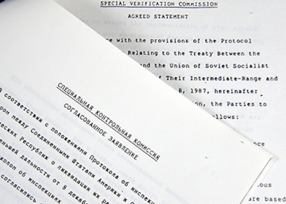 Image of two papers with text.