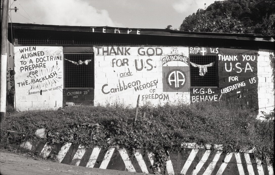 Image of a building with writing on the walls.