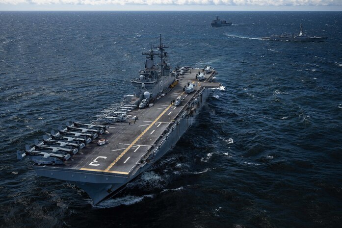 From left to right, the Wasp-class amphibious assault ship USS Kearsarge (LHD 3), the Whidbey Island-class amphibious dock landing ship USS Gunston Hall (LSD 44) and the Arleigh Burke-class guided-missile destroyer USS Gravely (DDG 107) sail in formation during a maneuvering exercise with the Finnish and Swedish navies in the Baltic Sea, May 17, 2022.