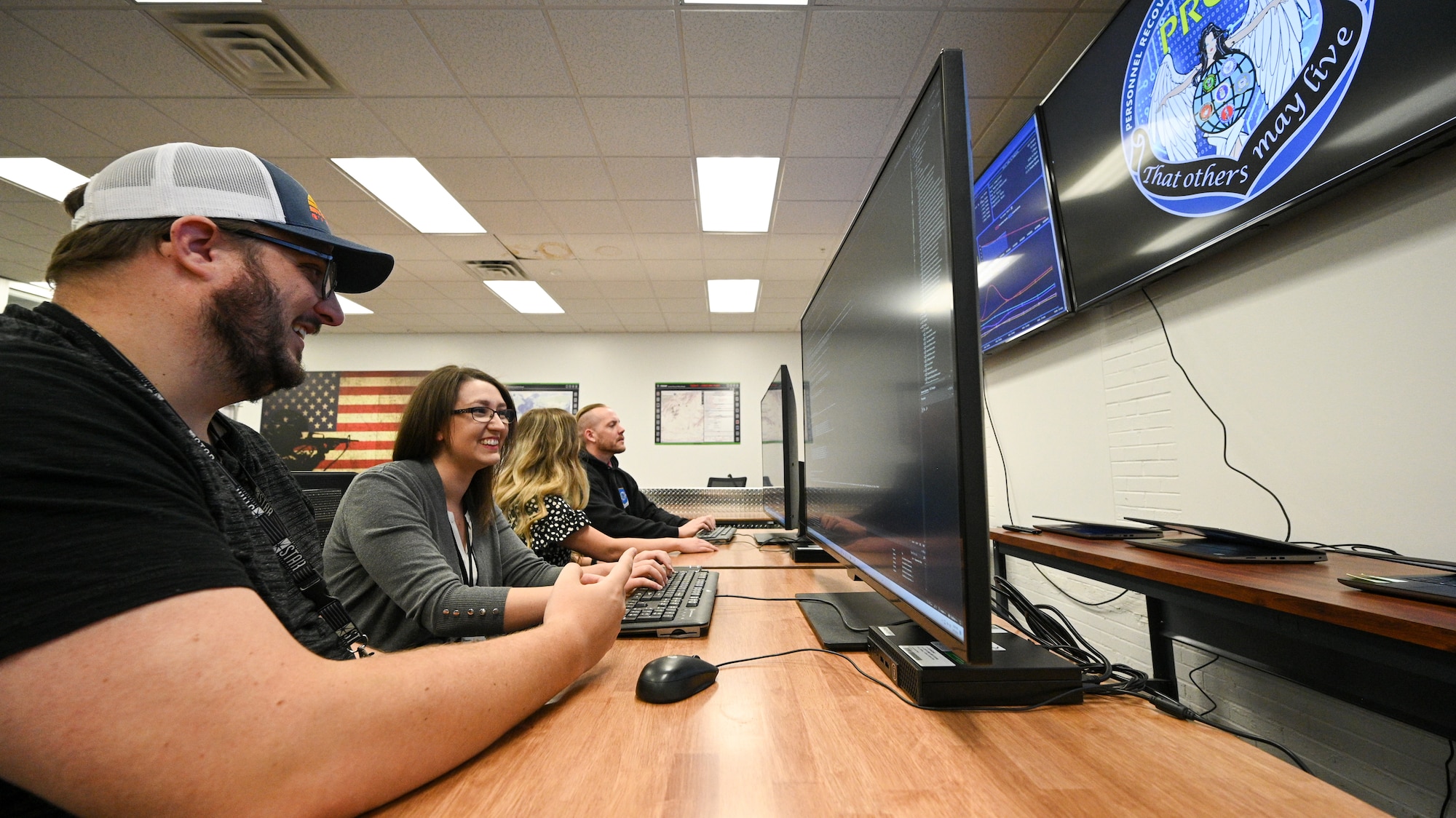 William Stettler and Chalee Staheli, 309th Software Engineering Group, work computer code at Hill Air Force Base, Utah, May 11, 2022