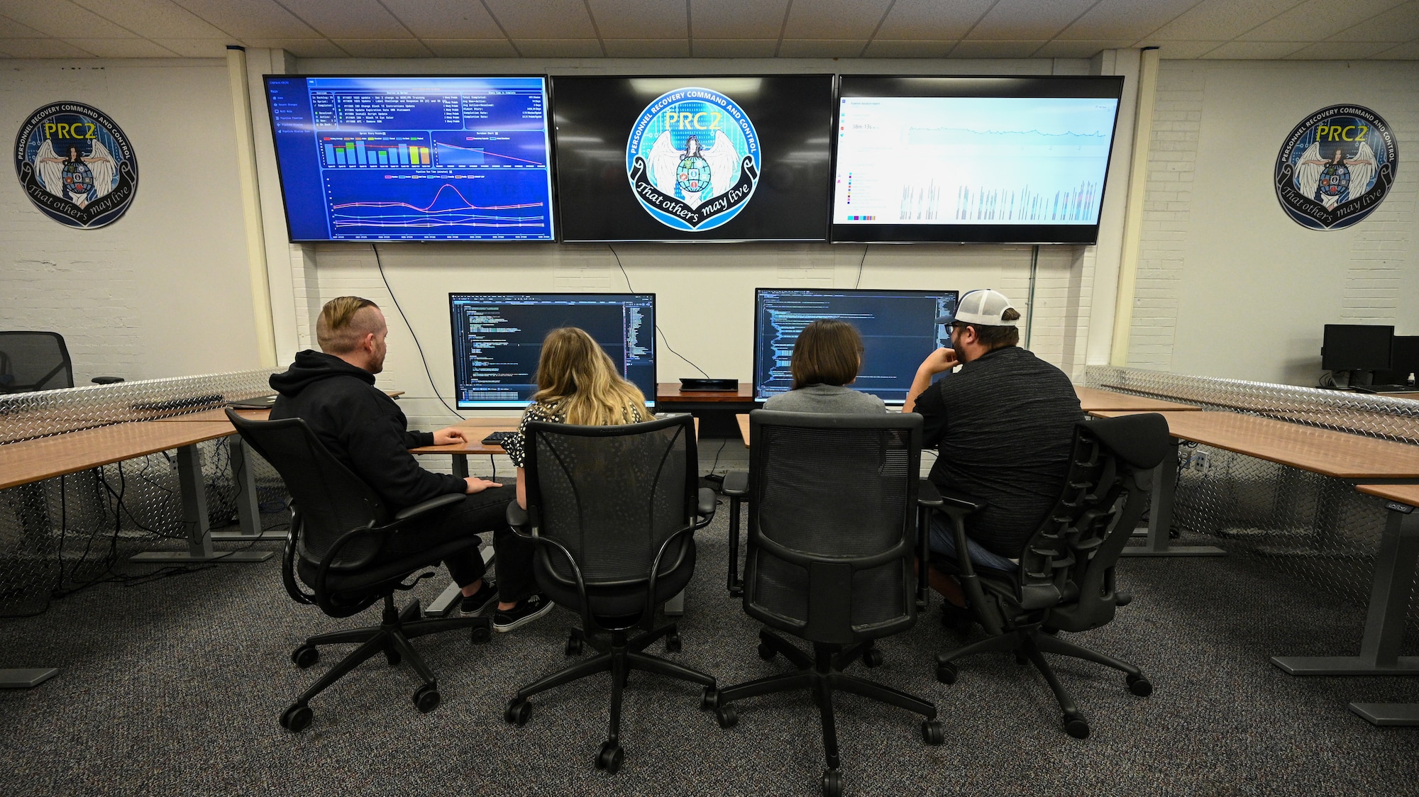 Software engineers with the 309th Software Engineering Group work computer code at Hill Air Force Base, Utah, May 11, 2022.