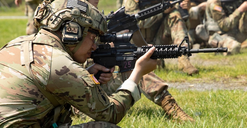 Spc. Jin Jun Lin, Headquarters and Headquarters Battalion, 28th Infantry Division, engages his target during the kneeling portion of the Governor's Twenty competition on May 21, 2022. Lin was up against Soldiers and Airmen from across the PA Guard to earn the top 20 spot.