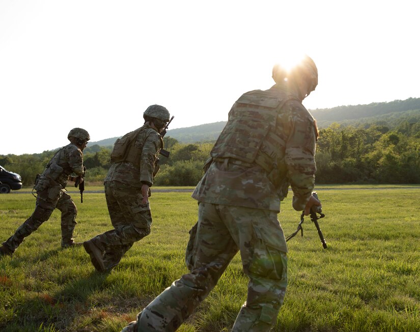 Soldiers and Airmen move to the next marker to engage their targets during the Governor's Twenty on May 21, 2022.