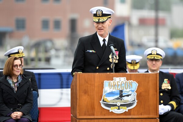 Adm. Frank Caldwell, director of the Naval Nuclear Propulsion Program, delivers remarks during a commissioning ceremony for the Virginia-class fast attack submarine USS Oregon (SSN 793) in Groton, Conn., May 28, 2022.