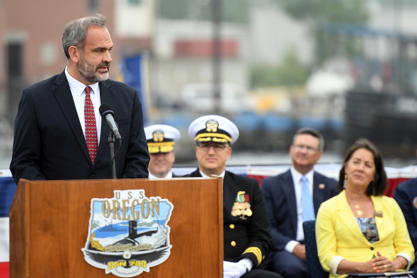 Tommy Ross, performing the duties of Assistant Secretary of the Navy for Research, Development, and Acquisition, delivers remarks during a commissioning ceremony for the Virginia-class fast attack submarine USS Oregon (SSN 793) in Groton, Conn., May 28, 2022.