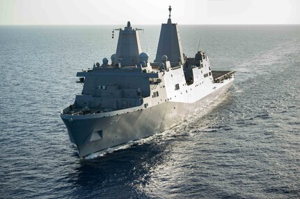 The San Antonio-class amphibious transport dock ship USS Arlington (LPD 24) transits the Caribbean Sea en route to Haiti to support humanitarian assistance and disaster relief efforts, Aug. 21, 2021.
