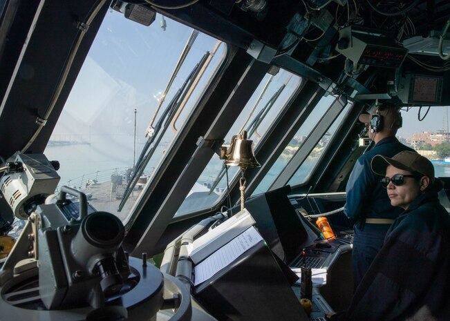 220529-N-NR343-1089 SUEZ CANAL, Egypt (May 29, 2022) Sailors assigned to littoral combat ship USS Sioux City (LCS 11) stand watch in the bridge while transiting the Suez Canal, Egypt, May 29. Sioux City is deployed to the U.S. 5th Fleet area of operations to help ensure maritime security and stability in the Middle East region.