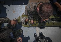 U.S. Marines, assigned to Task Force 61 Naval Amphibious Forces Europe/ 2d Marine Division (TF-61/2), and members of the Tunisian 51st Regiment Commando Maritime practice hoisting drills on the Tunisian NRF Khaireddine (A 700) during exercise Phoenix Express 2022 in Bizerte, Tunisia, May 24, 2022.