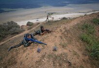 U.S. Marines, assigned to Task Force 61 Naval Amphibious Forces Europe/ 2d Marine Division (TF-61/2), and members of the Tunisian 51st Regiment Commando Maritime practice scout-swimmer techniques and clandestine landing and withdrawal during exercise Phoenix Express 2022 in Bizerte, Tunisia, May 24, 2022.