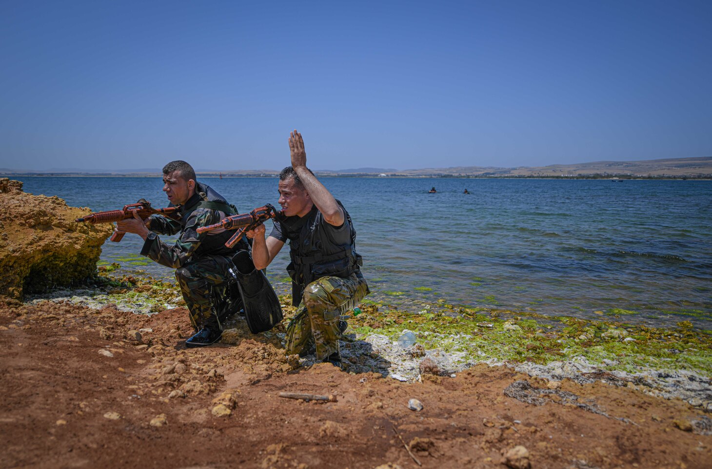 U.S. Marines, assigned to Task Force 61 Naval Amphibious Forces Europe/ 2d Marine Division (TF-61/2), and members of the Tunisian 51st Regiment Commando Maritime practice scout-swimmer techniques and clandestine landing and withdrawal during exercise Phoenix Express 2022 in Bizerte, Tunisia, May 24, 2022.