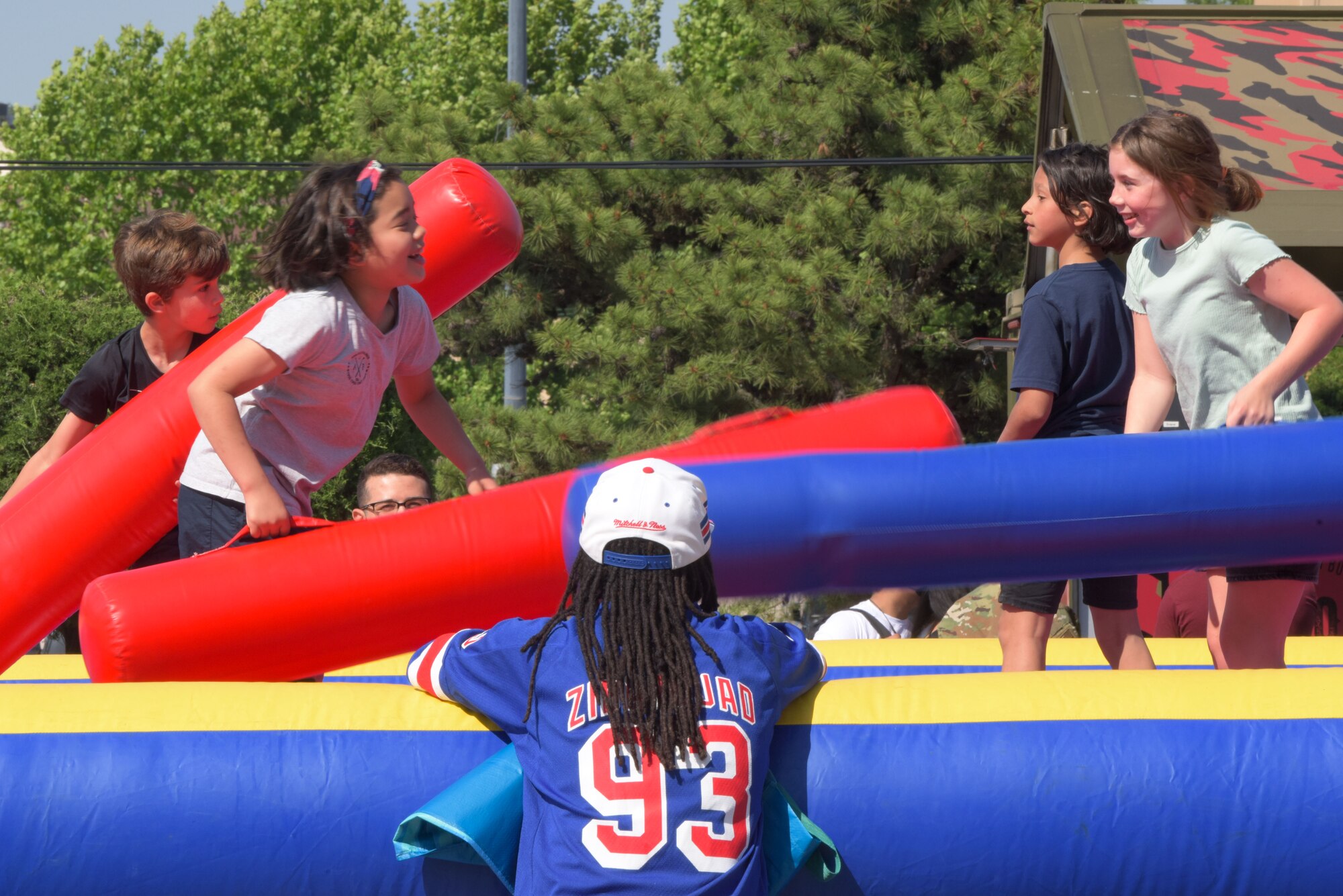 Children play in an inflatable arena during the Memorial Day Bash at Osan Air Base, Republic of Korea, May 26, 2022.