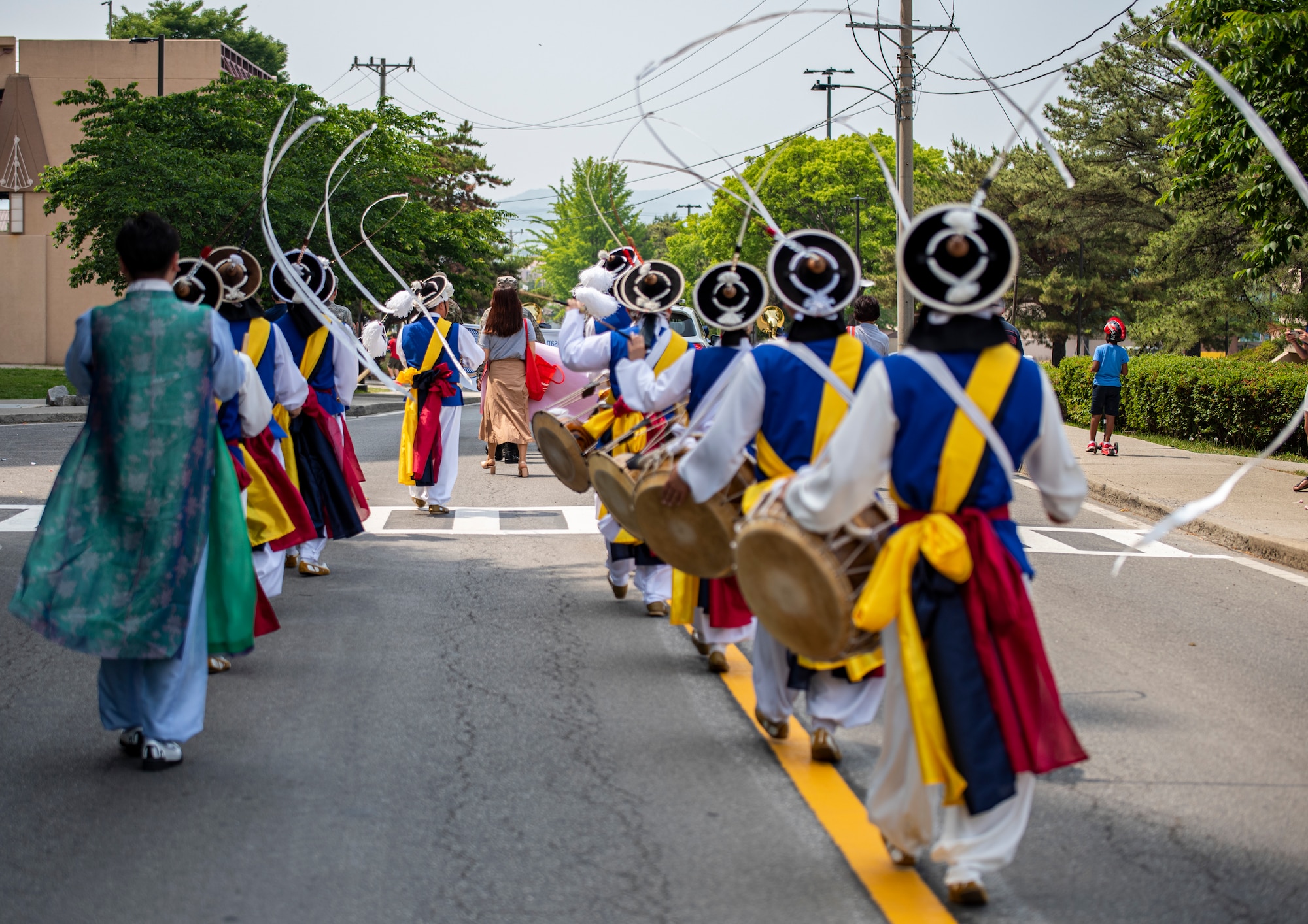 Pyeongtaek International Exchange Foundation (PIEF) members play instruments and perform during the Armed Forces Day Parade.