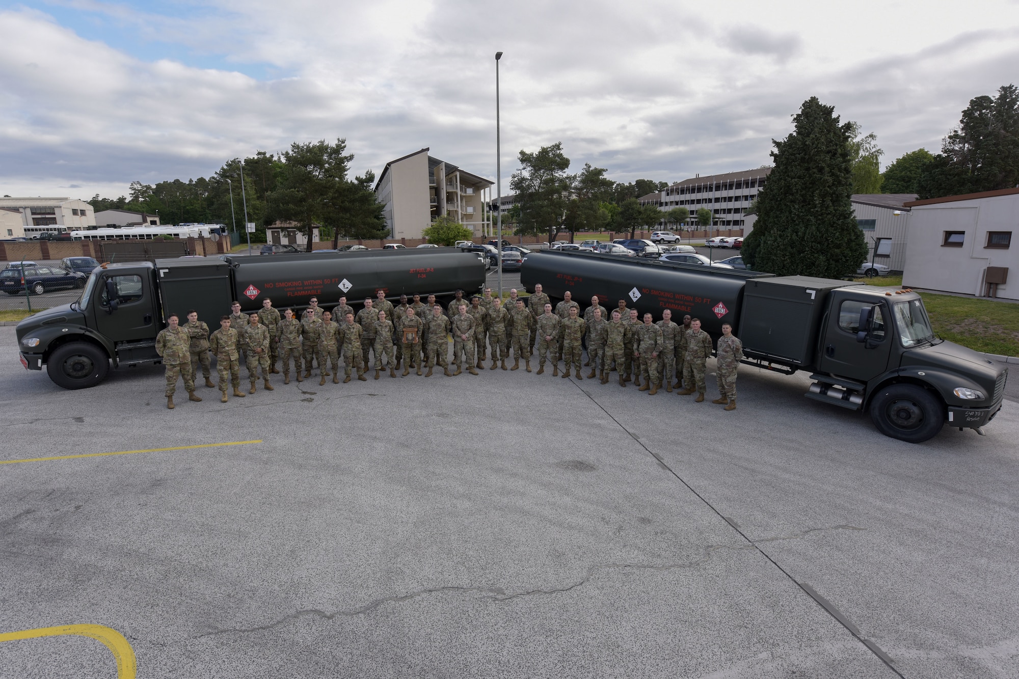 Airmen pose for a photo in group