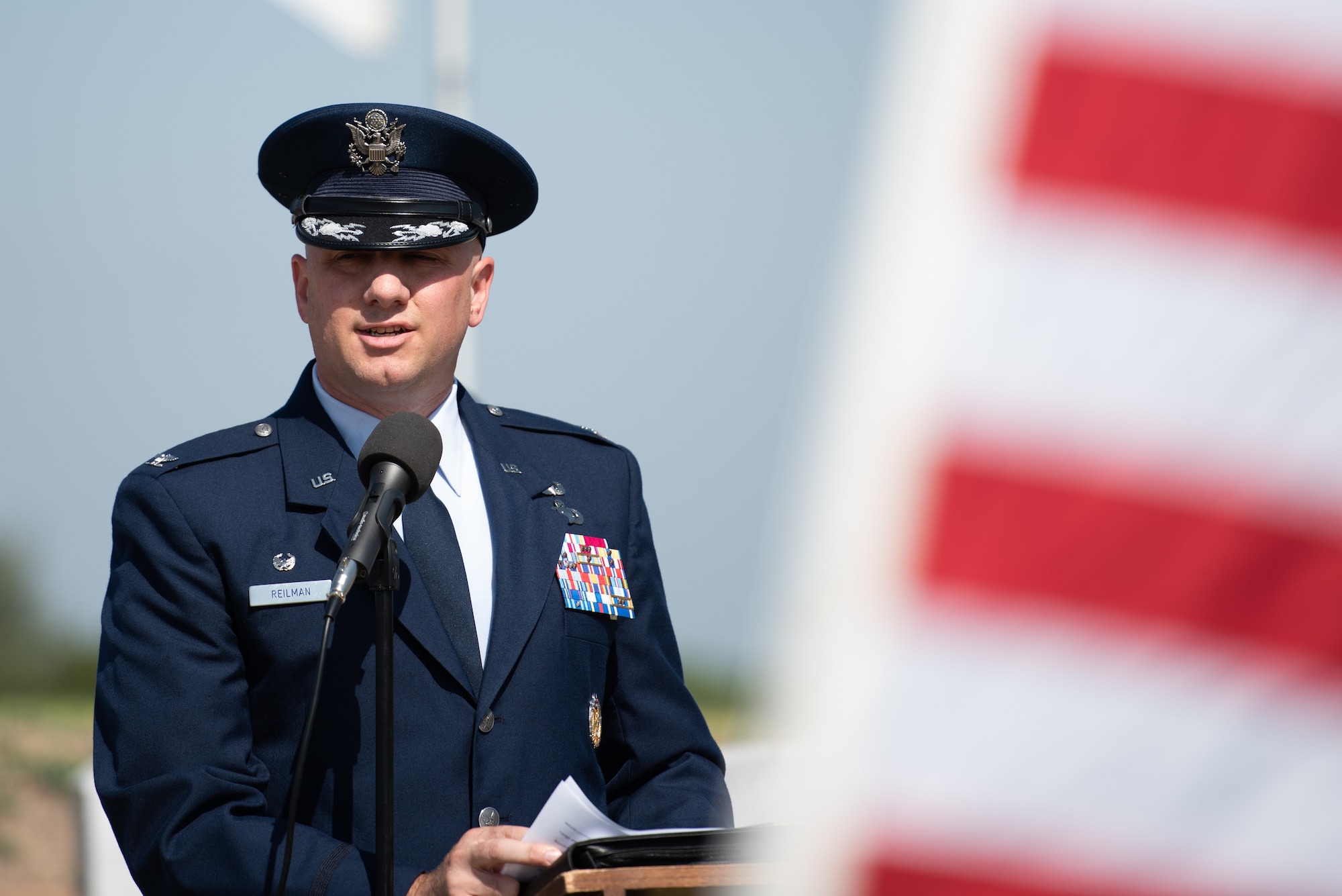 U.S. Air Force Col. Matthew Reilman, 17th Training Wing commander, speaks during a Memorial Day service at Lawnhaven Memorial Gardens, San Angelo, Texas, May 30, 2022. Memorial Day is a time to honor the service and sacrifice of the Soldiers, Sailors, Airmen, Marines, Guardians, and Coast Guardsmen that gave their lives in defense of the United States. (U.S. Air Force photo by Senior Airman Michael Bowman)