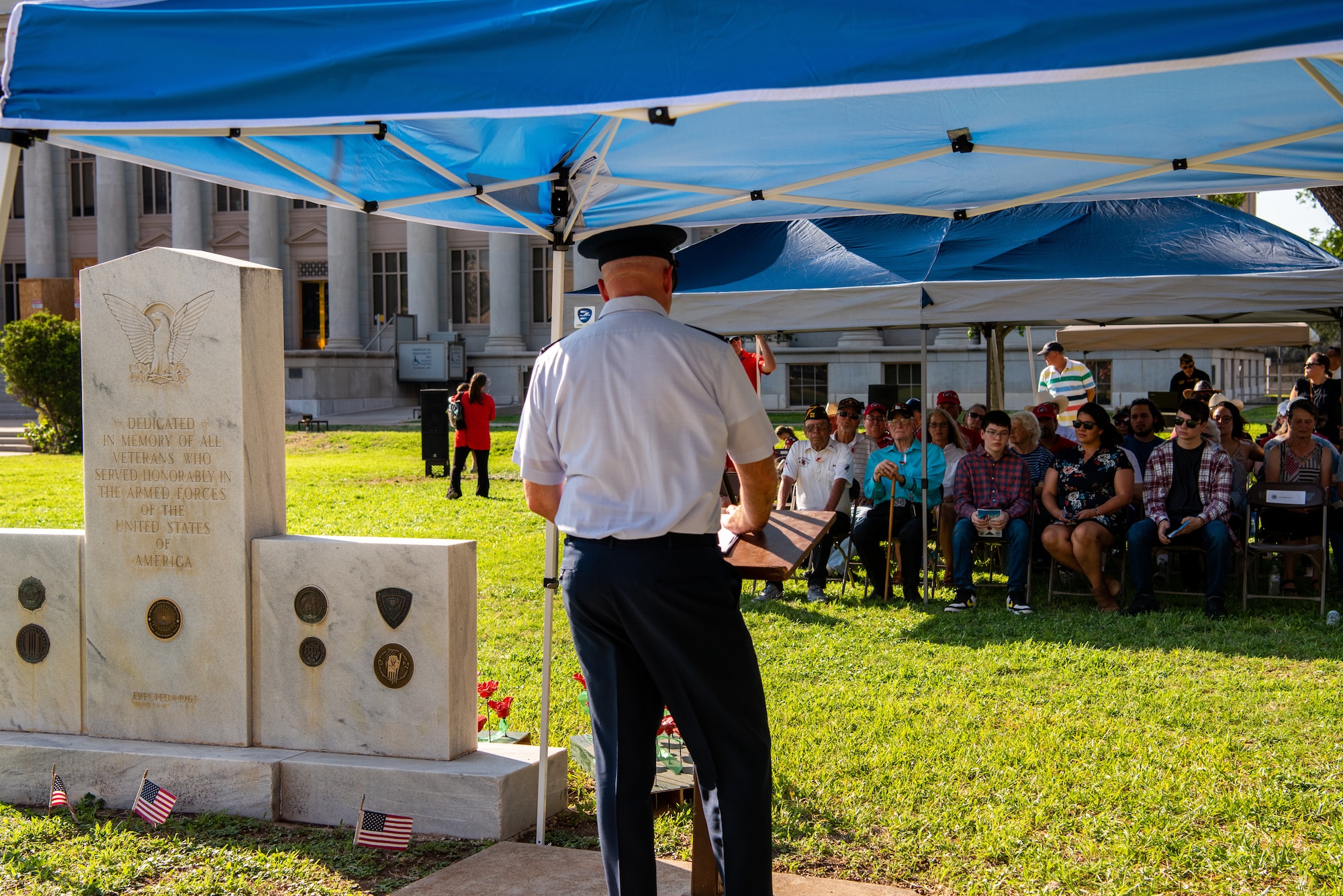U.S. Air Force Col. Matthew Reilman, 17th Training Wing commander, speaks during a Memorial Day service at the Tom Green County Courthouse Lawn, San Angelo, Texas, May 30, 2022. Reilman emphasized the importance of honoring those who gave their lives in the line of duty as well as those who carry on without them. (U.S. Air Force photo by Senior Airman Michael Bowman)