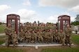 Kentucky National Guard's Headquarters and Headquarters Detachment (HHD), 75th Troop Command poses for a group photo at the end of Operation Tradewinds 2022 at Price Barracks, Belize on May 20, 2022. HHD, 75th Troop Command provided brigade level support to Tradewinds 22, a multinational exercise designed to expand the Caribbean region’s capability to mitigate, plan for and respond to crises; increase regional training capacity and interoperability; develop new and refine existing standard operating procedures (SOPs); enhance ability to defend exclusive economic zones (EEZ); and promote human rights and adherence to shared international norms and values; fully integrate women into defense, peace and security missions; and increase maritime domain awareness to deter illegal, unregulated and unreported fishing activities (U.S. Army photo by Staff Sgt. Andrew Dickson).