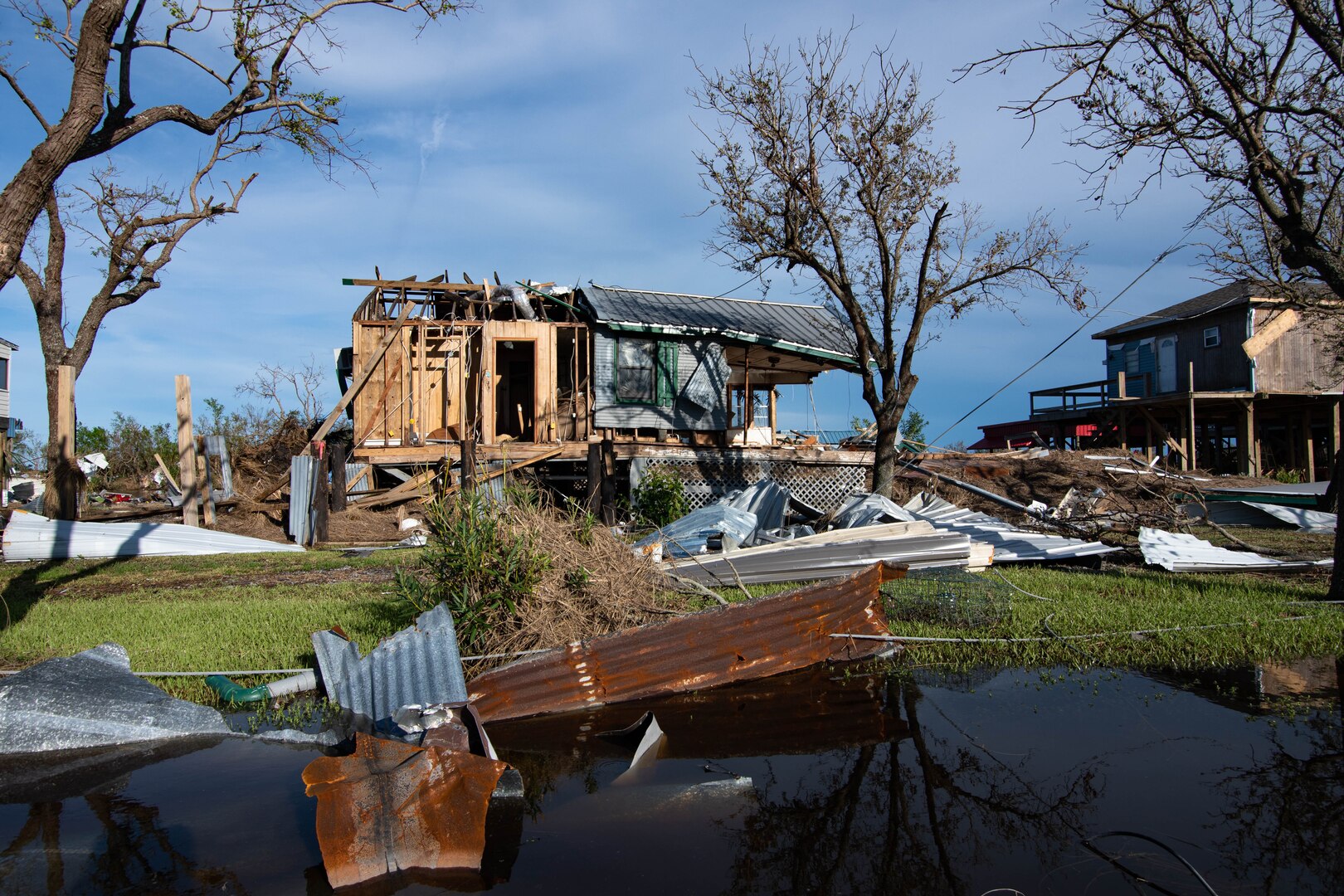 A home severely damaged after a hurricane.