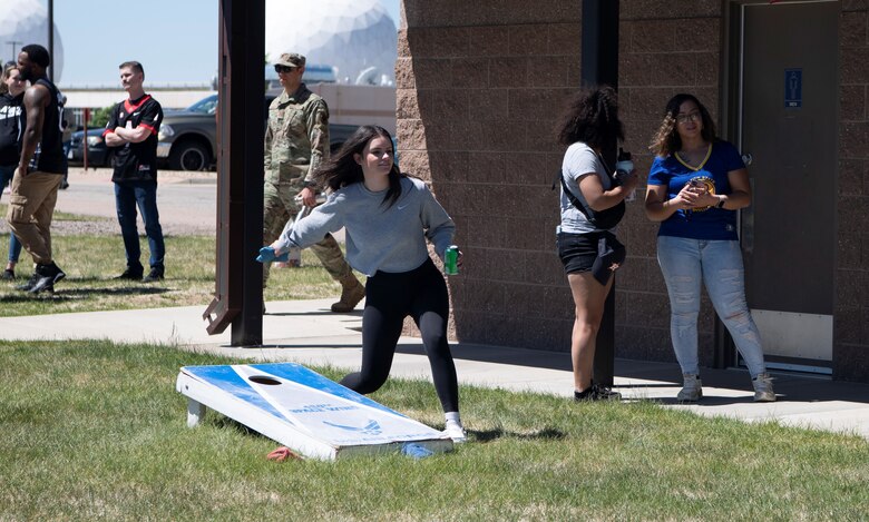 Team Buckley members play cornhole following the commander’s call May 26, 2022 at Buckley Space Force Base, Colo.