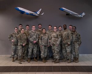 Members of the 932nd Airlift Wing and 375th Air Mobility Commnd, command post, pose for a group photo, March 31, 2022. (U.S. Air Force photo by Staff Sgt. Brooke Spenner)