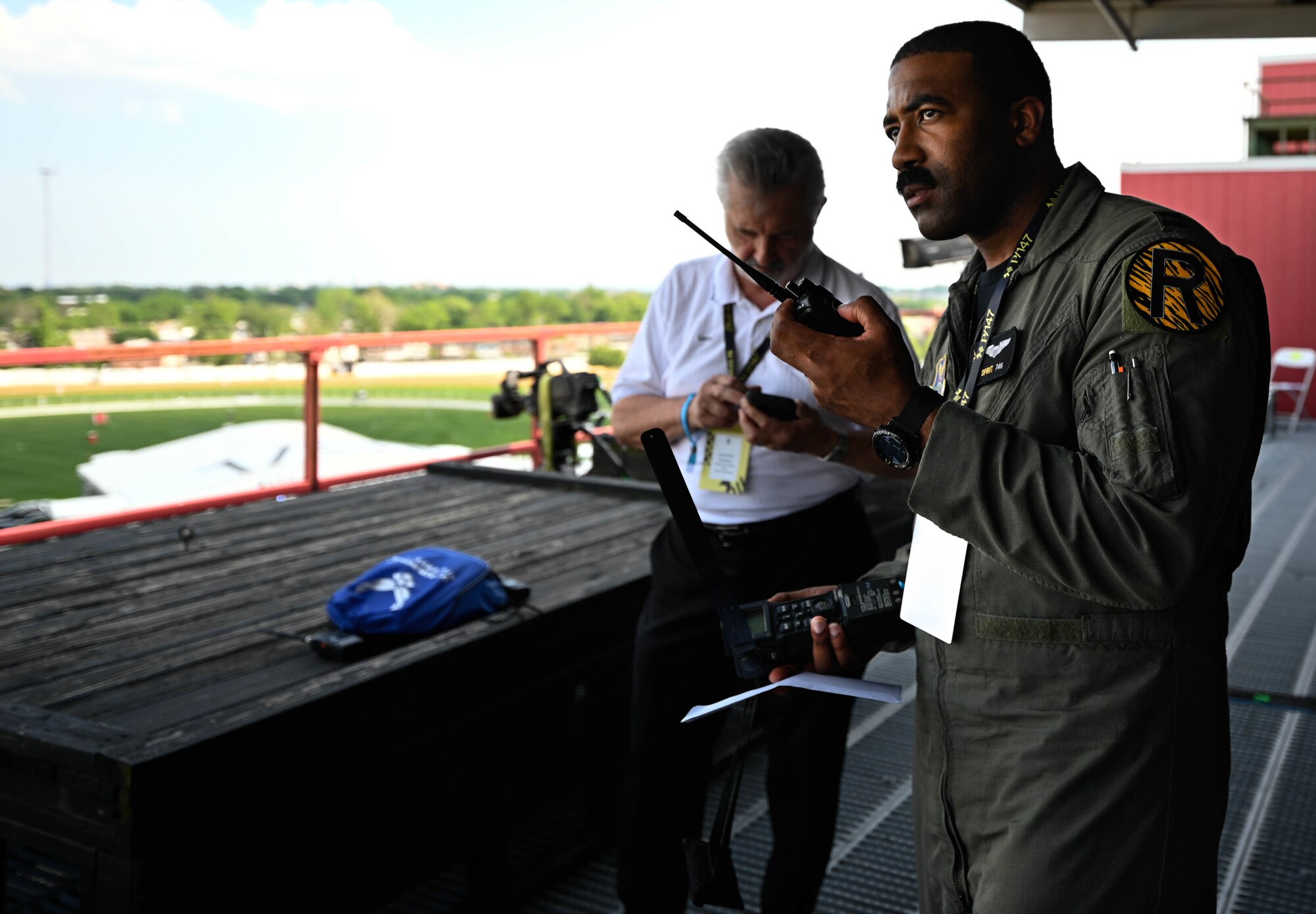 A U.S. Air Force B-2 Spirit pilot provides ground crew assistance for a B-2 Spirit Stealth Bomber flyover during The Preakness at the Pimlico race course, Baltimore, Maryland, May 21, 2022. B-2 crews perform flyovers as part of regularly scheduled training flights and to support community functions and government events.