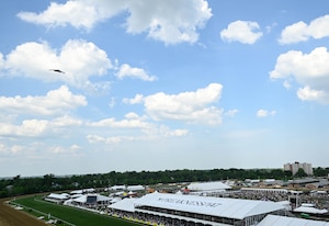 A B-2 Spirit Stealth Bomber performs a flyover during The Preakness at the Pimlico race course, Baltimore, Maryland, May 21, 2022. B-2 crews perform flyovers as part of regularly scheduled training flights and to support community functions and government events.