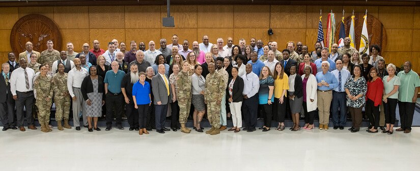 U.S. Army Financial Management Command leadership and USAFMCOM Military Pay Operations employees pose for a photo during an Army Military Pay Office leadership forum at the Maj. Gen. Emmett J. Bean Federal Center in Indianapolis May 12, 2022. Throughout the three-day forum, subject matter experts from USAFMCOM, the Defense Finance and Accounting Service, and other U.S. Army organizations covered a variety of topics including military pay operations, human resources, debt and claims, SmartVoucher for permanent change of station moves, fraud, ethics, and Army-specific functions. (U.S. Army photo by Mark R. W. Orders-Woempner)