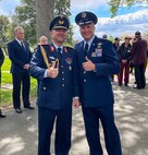 Brig. Gen. Frank Gräfe, the defense attaché from the Federation of Germany to the United States, (left) and Brig. Gen. Daniel D. Boyack, Commander of the Utah Air National Guard & Assistant Adjutant General-Air, (right) pose using the iconic “thumbs up” that Gail Halvorsen was known for on May 20th at the Provo City Cemetary.