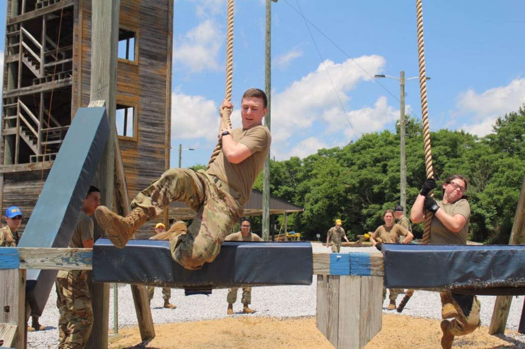 Air Force ROTC cadets take part in an obstacle course in May 2022, on Maxwell Air Force Base, Alabama. This is the first time since 2019 that field training will be conducted at normal capacity on Maxwell throughout the summer, marking a departure from modified operations as the COVID-19 pandemic abates.