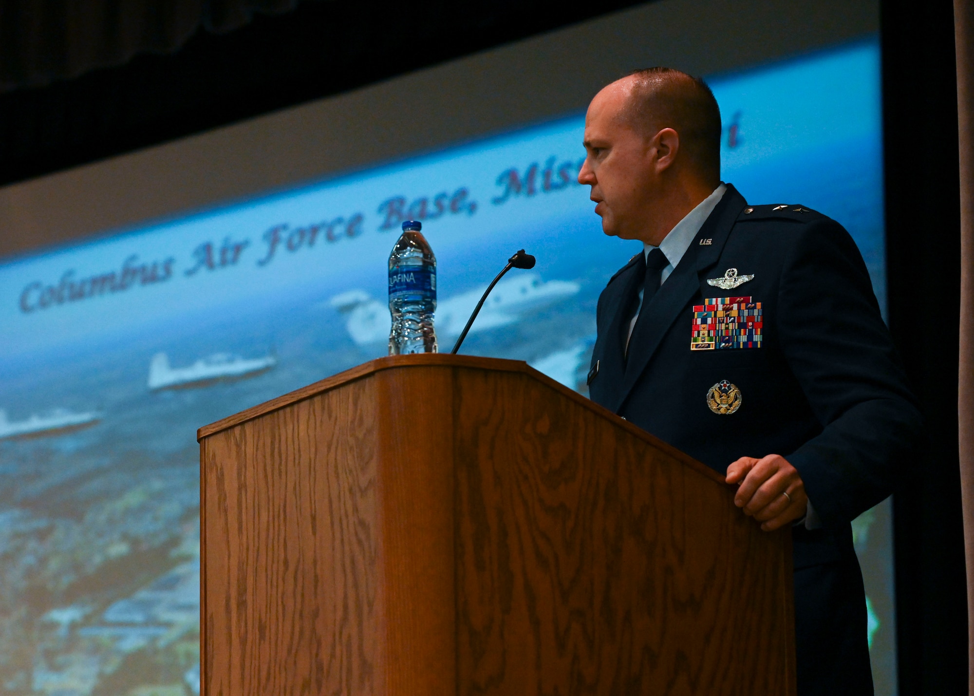 U.S. Air Force Maj. Gen. John Nichols, Global Power Programs, Office of the Assistant Secretary of the Air Force for Acquisition, Technology and Logistics, director, the Pentagon, Arlington, Virginia, delivers the graduation speech to Specialized Undergraduate Pilot Training class 22-10, May 26, 2022, on Columbus Air Force Base, Miss. During SUPT student pilots train in the T-6A Texan II and T-1A Jayhawk or T-38C Talon.  (U.S. Air Force photo by Airman 1st Class Jessica Haynie)