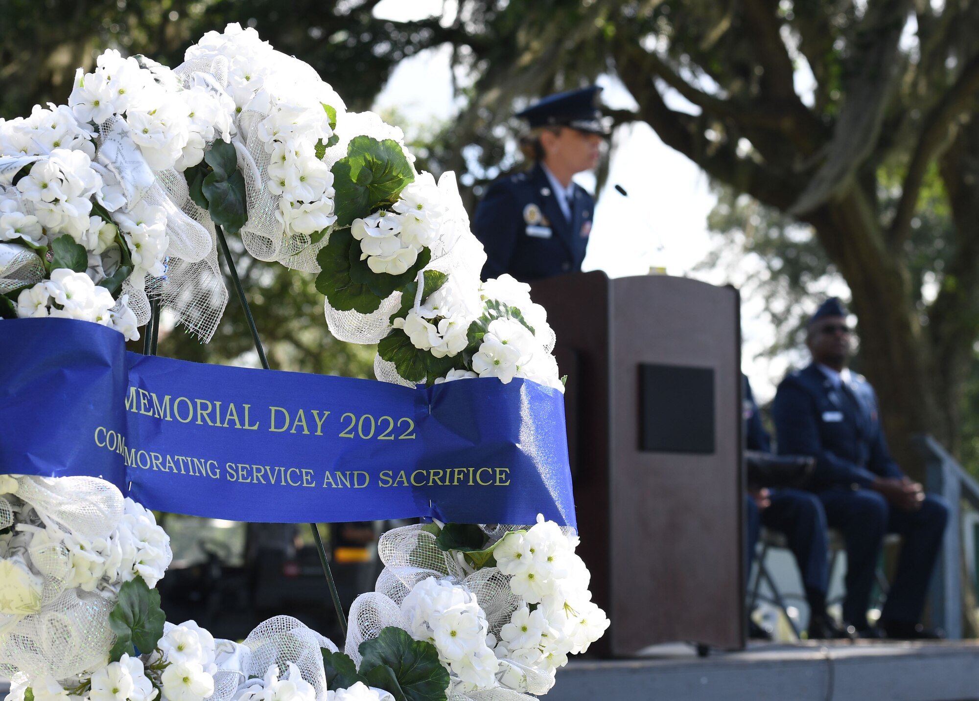 A Memorial Day wreath is on display during the Biloxi National Cemetery Memorial Day Ceremony in Biloxi, Mississippi, May 30, 2022. The ceremony honored those who have made the ultimate sacrifice while serving in the armed forces. Biloxi National Cemetery is the final resting place of more than 23,000 veterans and their family members. Every year, 800 burials take place there for men and women who served in wars years ago and for those defending America today. (U.S. Air Force photo by Kemberly Groue)