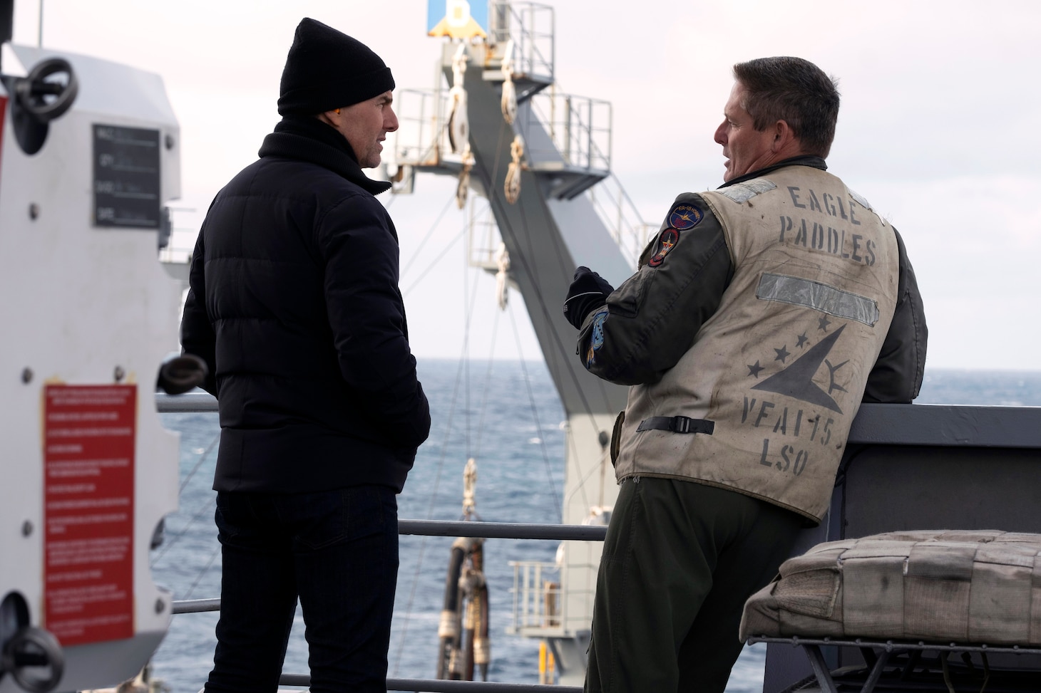 Navy Aerial Advisor Capt. Brian Ferguson and Tom Cruise on the set of Top Gun: Maverick by Paramount Pictures, Skydance and Jerry Bruckheimer Films.