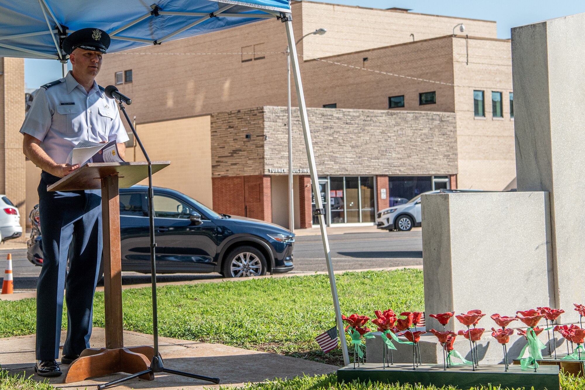 U.S. Air Force Col. Matthew Reilman, 17th Training Wing commander, speaks during a Memorial Day service at the Tom Green County Courthouse Lawn, San Angelo, Texas, May 30, 2022. Reilman emphasized the importance of honoring those who gave their lives in the line of duty as well as those who carry on without them. (U.S. Air Force photo by Senior Airman Michael Bowman)