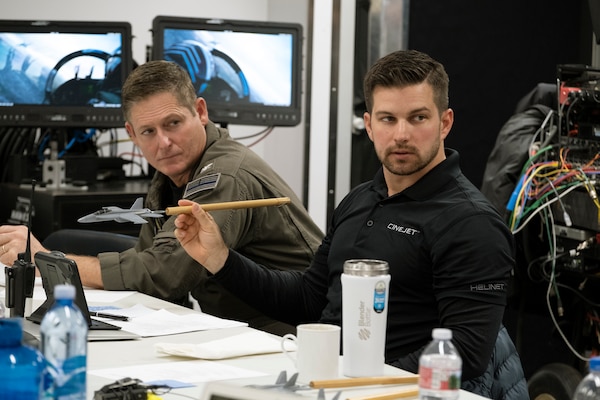 Navy Aerial Advisor Capt. Brian Ferguson and Aerial Coordinator/Lead Camera Jet Pilot Kevin LaRosa II on the set of Top Gun: Maverick by Paramount Pictures, Skydance and Jerry Bruckheimer Films.