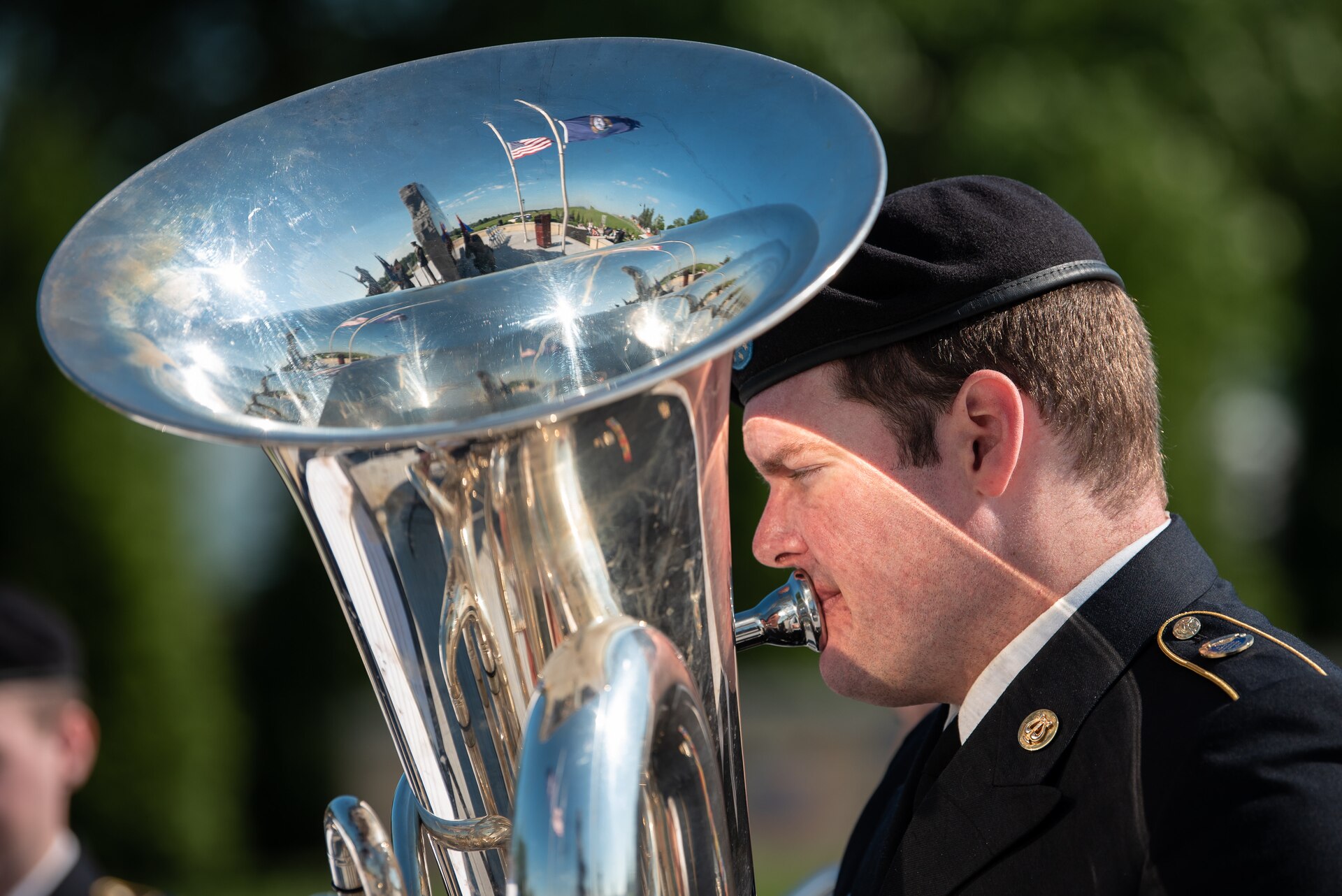Army Sgt. Brian Ewalt of the Kentucky National Guard’s 202nd Army Band performs May 30, 2022, during at a service honoring members of the Kentucky Guard who have died in the line of duty. The serviced, held at Boone National Guard Center in Frankfort, Ky., commemorated 13 soldiers whose names were added to the Kentucky National Guard Memorial this year. Of the names being added, 11 were killed during World War I, one in 1935 during weekend training, and another in 2001 just prior to 9/11. The monument now honors 286 Solders and Airmen from the Kentucky Guard who have paid the ultimate price for freedom since 1912. (U.S. Air National Guard photo by Dale Greer)