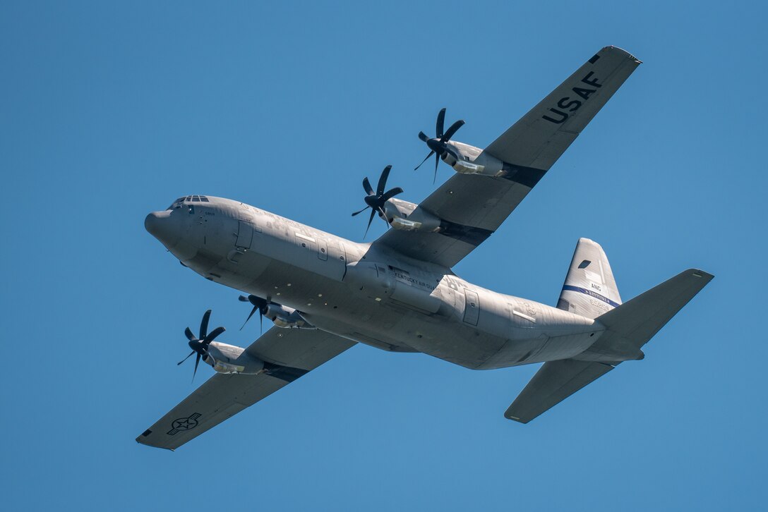 A Kentucky Air National Guard C-130J Super Hercules performs a fly-over at Boone National Guard Center in Frankfort, Ky., May 30, 2022, during a ceremony to honor the 286 Airmen and Soldiers from the Kentucky National Guard who have died in the line of duty since 1912. This year marks the 30th anniversary of a C-130 plane crash in Evansville, Ind., that claimed the lives of five aircrew members from the Kentucky Air Guard’s 123rd Airlift Wing. (U.S. Air National Guard photo by Dale Greer)