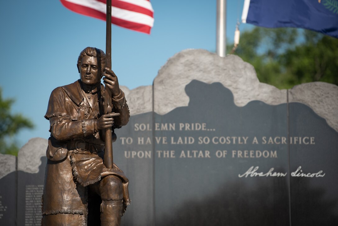 Officials added the names of 13 fallen Soldiers to the Kentucky National Guard Memorial during a ceremony at Boone National Guard Center in Frankfort, Ky., May 30, 2022. The monument now honors 286 Solders and Airmen from the Kentucky Guard who died in service to their nation since 1912. Of the 13 names being added, 11 were killed during World War I, one in 1935 during weekend training, and another in 2001 just prior to 9/11. (U.S. Air National Guard photo by Dale Greer)