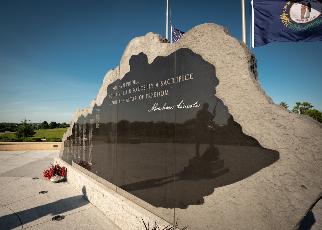 Officials added the names of 13 fallen Soldiers to the Kentucky National Guard Memorial during a ceremony at Boone National Guard Center in Frankfort, Ky., May 30, 2022. The monument now honors 286 Solders and Airmen from the Kentucky Guard who died in service to their nation since 1912. Of the 13 names being added, 11 were killed during World War I, one in 1935 during weekend training, and another in 2001 just prior to 9/11. (U.S. Air National Guard photo by Dale Greer)