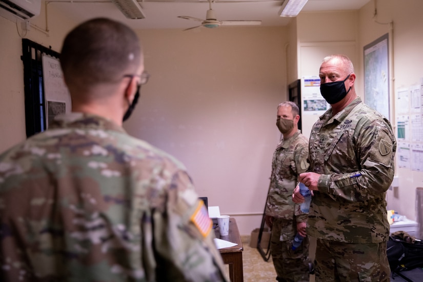 Kentucky National Guard Brig. Gen. Rob Larkin (right) and State Command Sgt. Maj. Jesse Withers (center) meets with members of the 75th Troop Command while they support Operation Tradewinds 22 at Price Barracks, Belize on May 18, 2022. 75th Troop Command supported Tradewinds 22 by providing brigade level support to over 1800 servicemembers from 22 countries (U.S. Army photo by Staff Sgt. Andrew Dickson).