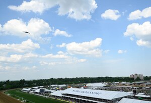 A B-2 Spirit Stealth Bomber performs a flyover during The Preakness at the Pimlico race course, Baltimore, Maryland, May 21, 2022. B-2 crews perform flyovers as part of regularly scheduled training flights and to support community functions and government events.
