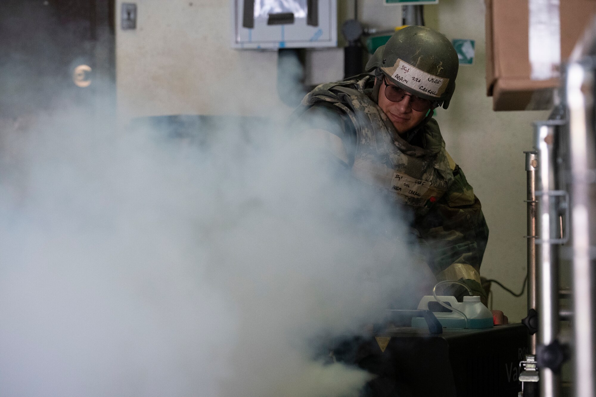 U.S. Air Force Staff Sgt. Adam Carroll, 51st Civil Engineer Squadron firefighter, operates a smoke machine during a fire rescue training event for Vigilant Storm 2023 at Osan Air Base, Republic of Korea, Oct. 31, 2022.